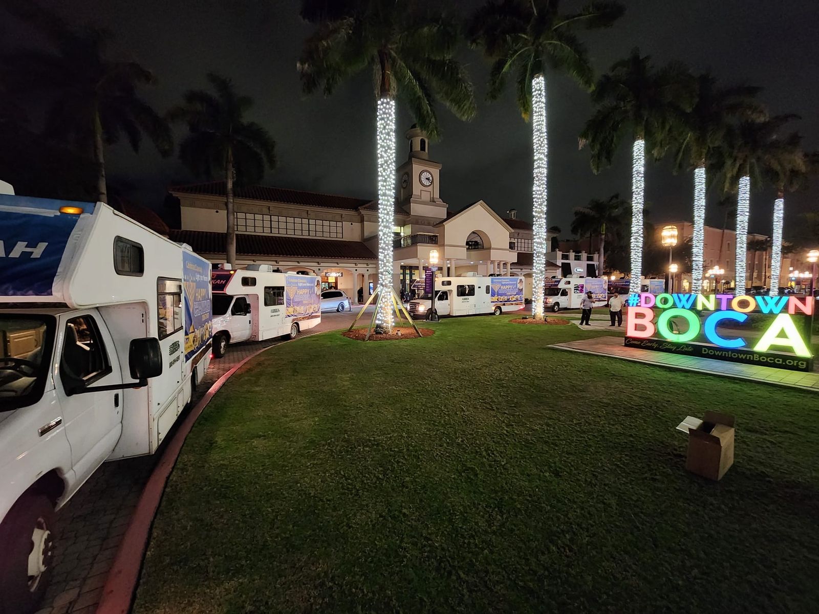 Evening menorah lighting event in downtown Boca Raton